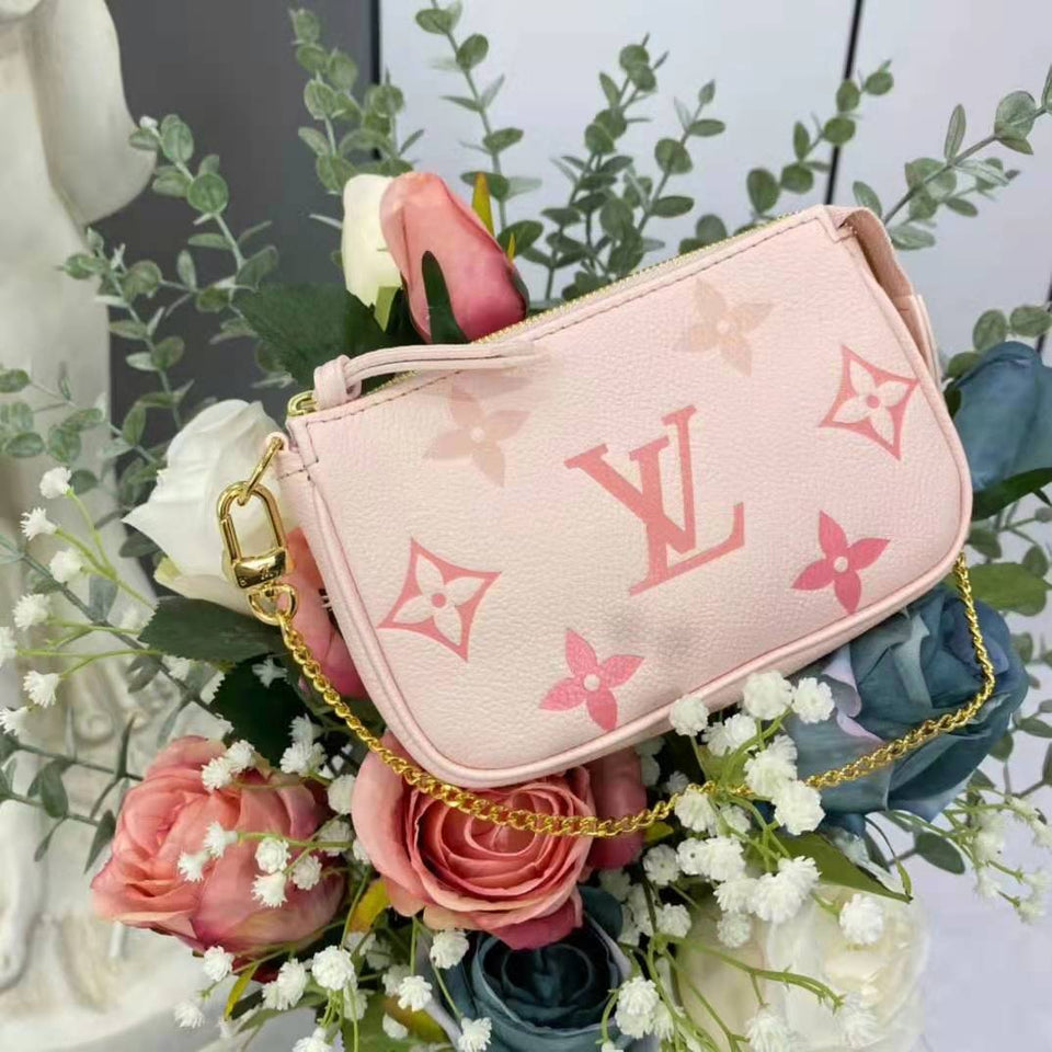 Louis Vuitton LV Women Mini Pochette Accessoires Pink Monogram Empreinte Embossed Supple Grained Cowhide Clutch