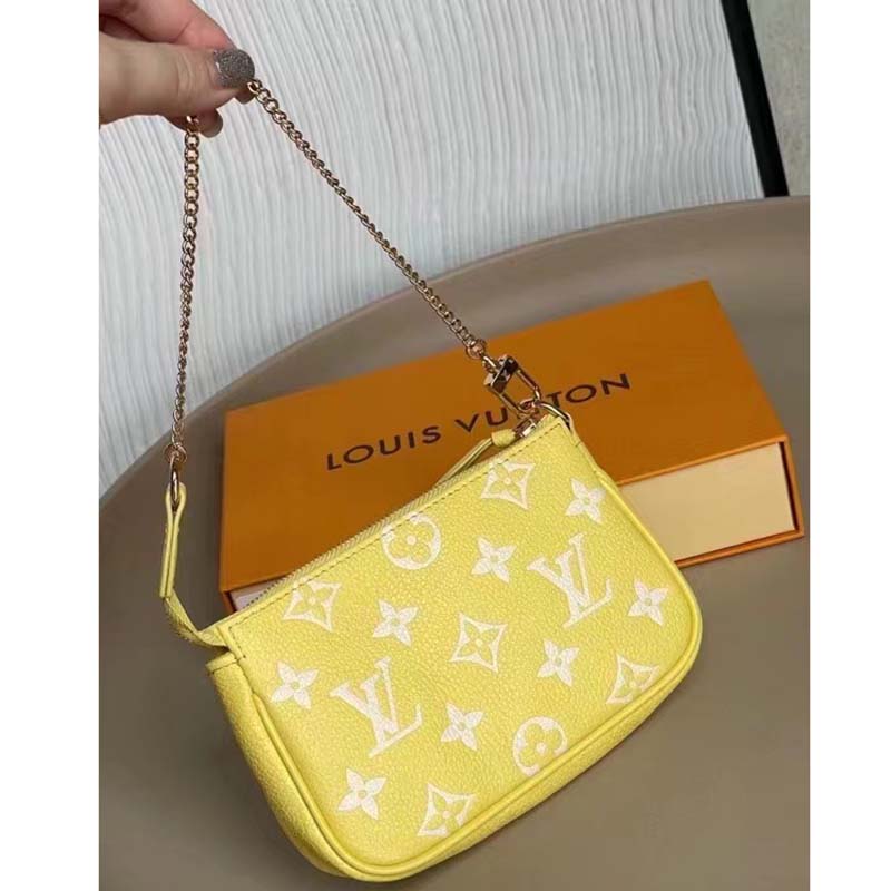Louis Vuitton LV Women Mini Pochette Accessoires Yellow Monogram Empreinte Embossed Supple Grained Cowhide Clutch