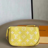 Louis Vuitton LV Women Mini Pochette Accessoires Yellow Monogram Empreinte Embossed Supple Grained Cowhide Clutch
