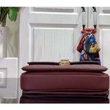 Louis Vuitton LV Women Pochette Métis Wine Red Monogram Empreinte Embossed Grained Cowhide Leather Clutch