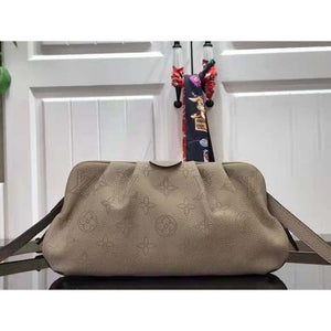Louis Vuitton LV Women Scala Mini Pouch Coquille Mahina Perforated Calf Leather Clutch