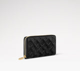 Louis Vuitton LAMBSKIN EMBOSSED MONOGRAM COUSSIN ZIPPY WALLET