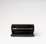Louis Vuitton LAMBSKIN EMBOSSED MONOGRAM COUSSIN ZIPPY WALLET