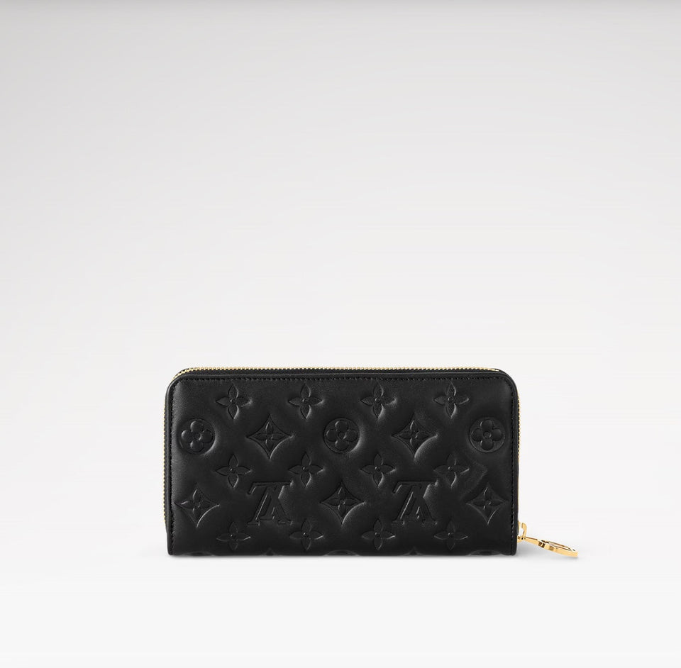 Louis Vuitton LAMBSKIN EMBOSSED MONOGRAM COUSSIN ZIPPY WALLET
