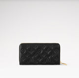 Louis Vuitton LAMBSKIN EMBOSSED MONOGRAM COUSSIN ZIPPY WALLET