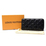 Louis Vuitton LAMBSKIN EMBOSSED MONOGRAM COUSSIN ZIPPY WALLET