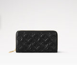 Louis Vuitton LAMBSKIN EMBOSSED MONOGRAM COUSSIN ZIPPY WALLET