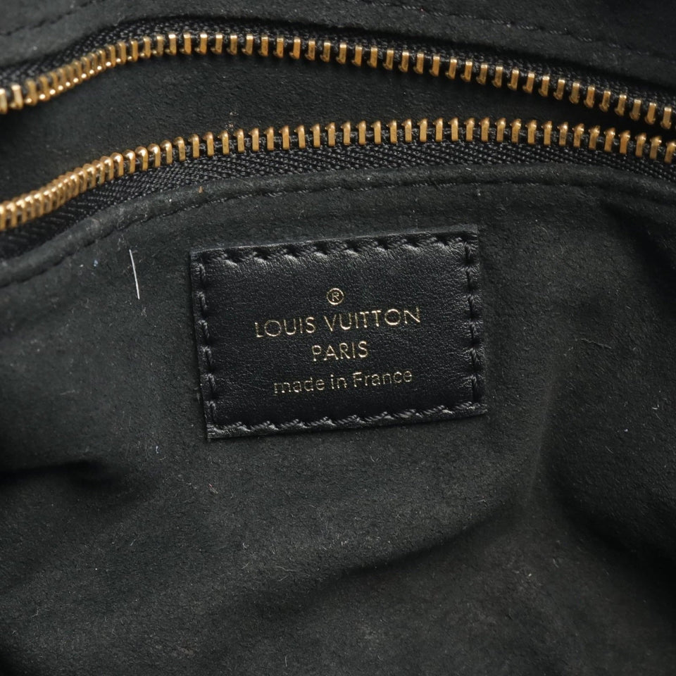 Louis Vuitton MONOGRAM CANVAS & LEATHER PETITE MALLE SOUPLE CROSSBODY