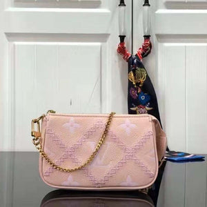 Louis Vuitton Women Mini Pochette Accessoires Pink Monogram Empreinte Embroidered Cowhide Clutch