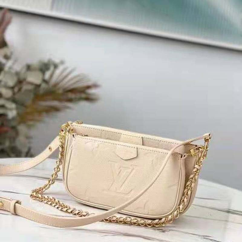 Louis Vuitton Women Multi Pochette Accessoires Cream Embossed Supple Grained Cowhide Clutch