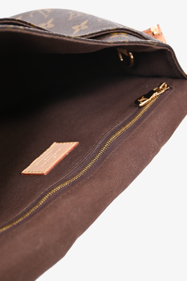 Louis Vuitton 2011 Monogram Leather Trimmed Menilmontant PM Crossbody Bag