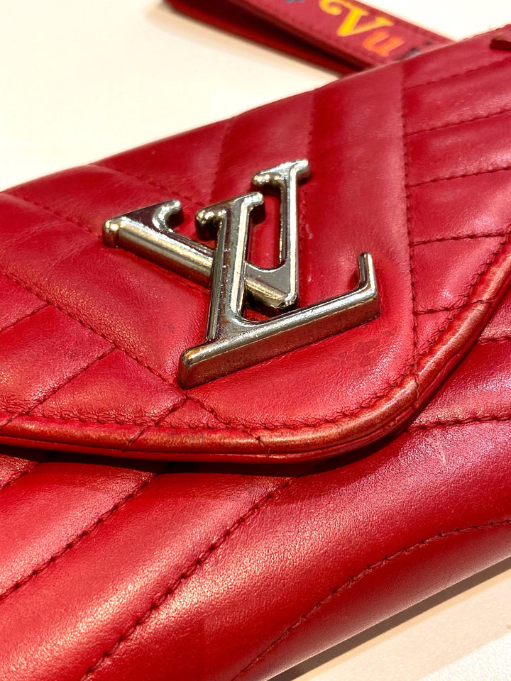 Louis Vuitton NEW WAVE LONG CALFSKIN WALLET WRISTLET