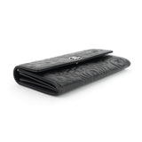 Chanel Embossed Camellia Lambskin Flap Wallet