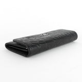 Chanel Embossed Camellia Lambskin Flap Wallet