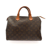 Louis Vuitton Handbag in Brown Canvas