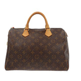 Louis Vuitton Limited Edition Orange Monogram Perforated Handbag