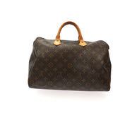 Louis Vuitton Handbag in Brown Canvas