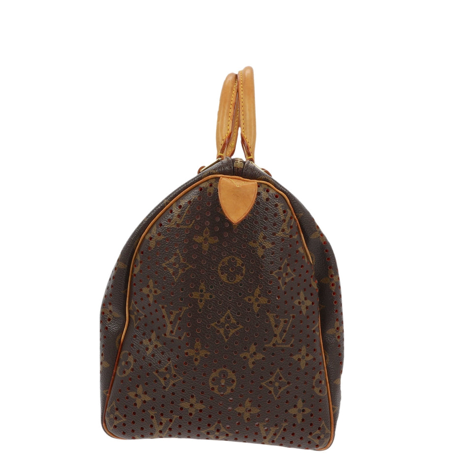 Louis Vuitton Limited Edition Orange Monogram Perforated Handbag