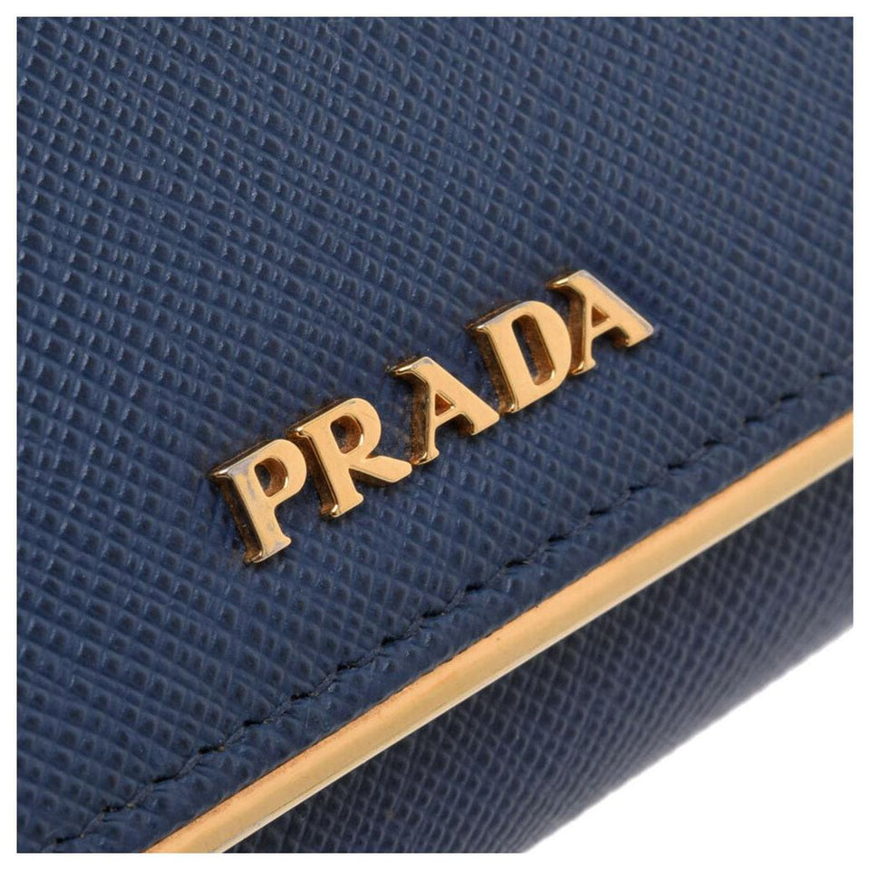 Prada SAFFIANO LEATHER METAL FRAME FLAP CONTINENTAL WALLET