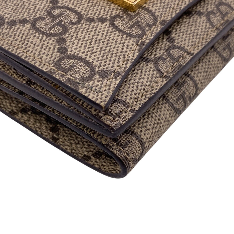 Gucci Tri-fold wallet 681700 PVC coated canvas beige Balenciaga Compact Wallet GG Supreme logo The Hacker Women