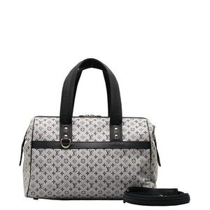 Louis Vuitton Louis Vuitton Monogram Mini Handbag Linen/Leather Naïve