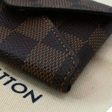 Louis Vuitton Kirigami Pochette Damier Ebene Clutch Brown