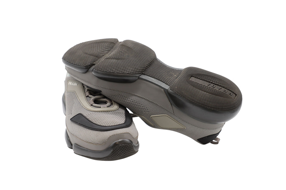Men's Prada Cloud Bust Sneakers In Grey Synthetic