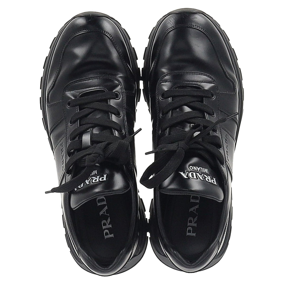 Prada Prax 01 Lace-Up Low-Top Sneakers in Black Calfskin Leather