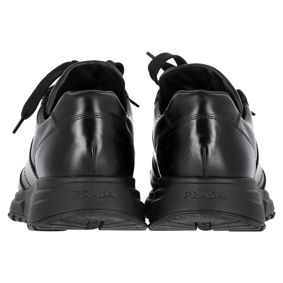 Prada Prax 01 Lace-Up Low-Top Sneakers in Black Calfskin Leather