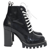 Louis Vuitton Star Trail Laced Zipped Platform Boots in Black Leather
