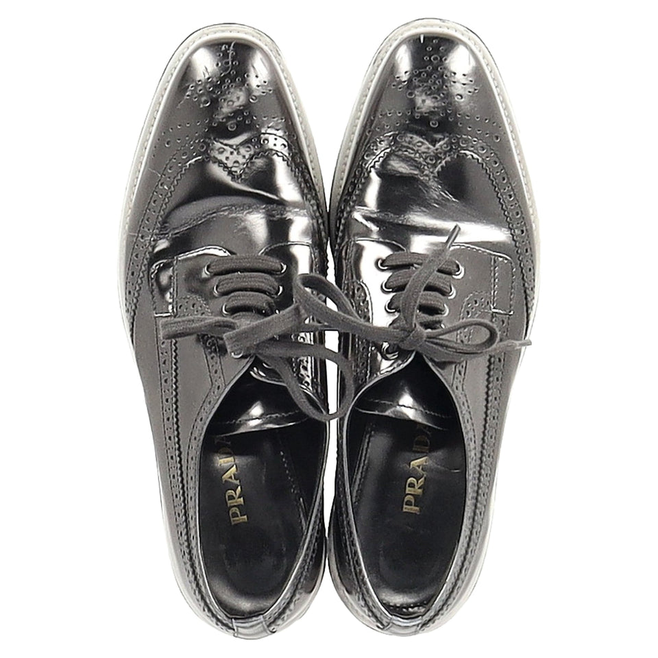 Prada Metallic Brogue Platform Low Top Sneakers in Silver Leather