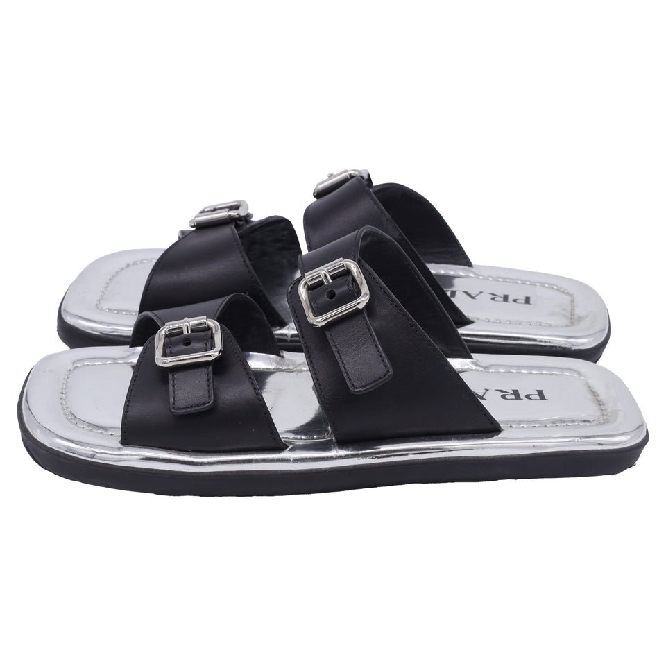 Prada Buckled Flat Sandals in Silver Leather
