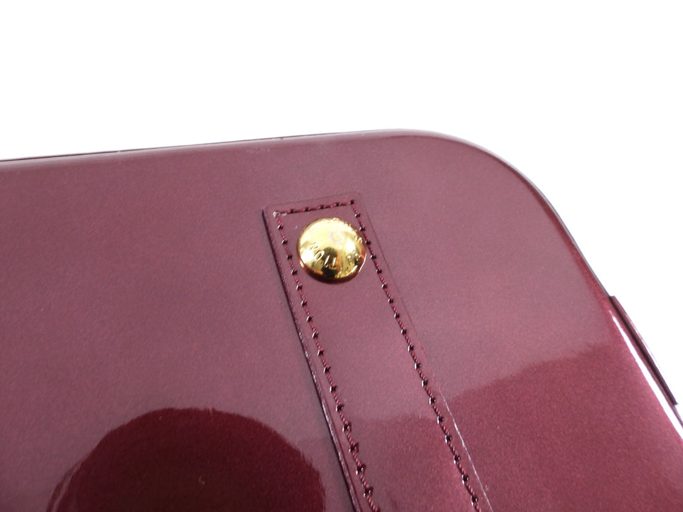 Louis Vuitton Alma PM bag in Monogram Vernis Rouge Fauviste