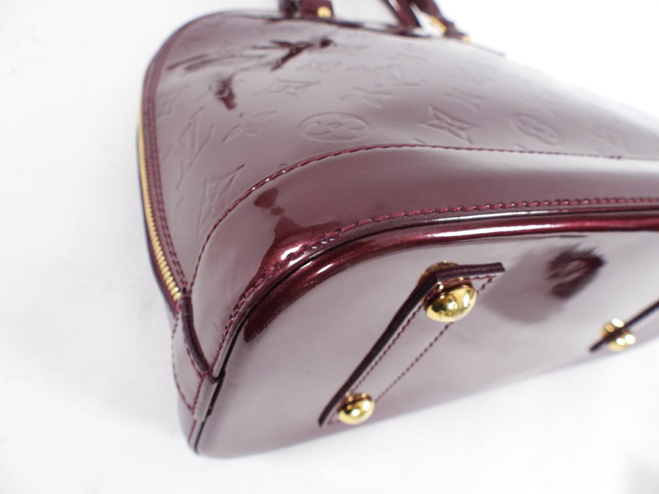 Louis Vuitton Alma PM bag in Monogram Vernis Rouge Fauviste