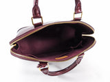 Louis Vuitton Alma PM bag in Monogram Vernis Rouge Fauviste