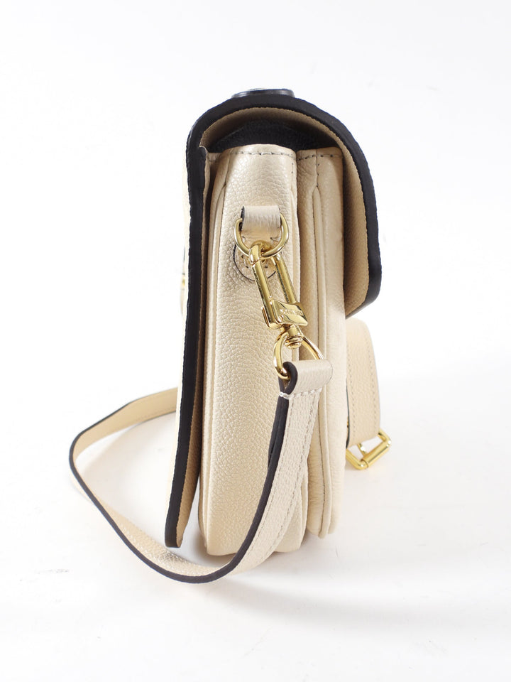 Louis Vuitton Pochette Metis Empreinte Monogram Crossbody Bag