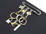 Louis Vuitton Silver and Gold Safety Pin Logo Charm Brooch