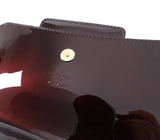 Louis Vuitton Vernis Sobe Clutch in Amarante